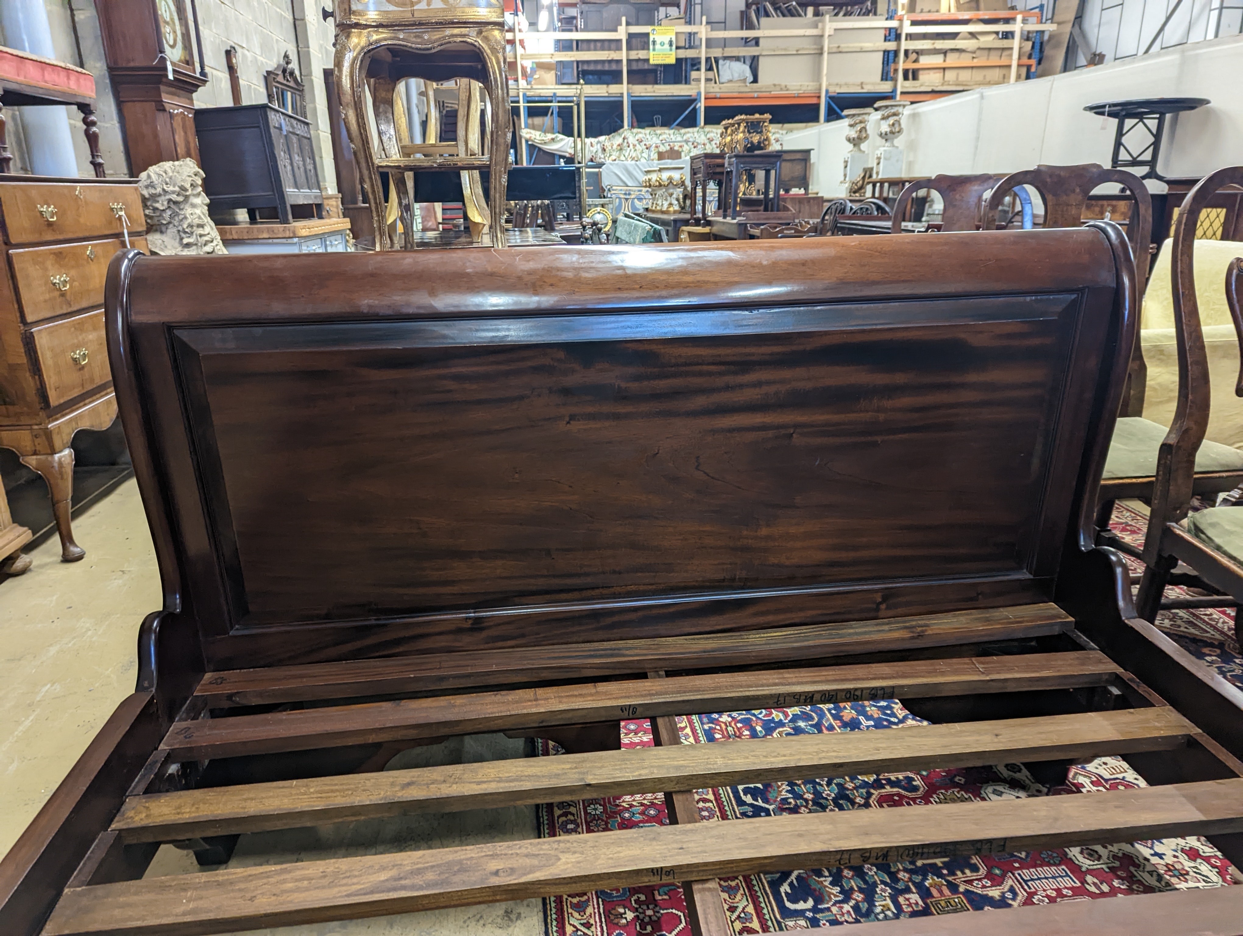 A French style mahogany sleigh bed, length 210cm, width 148cm